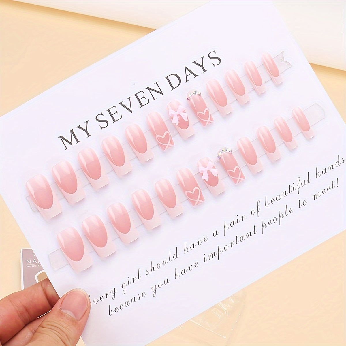 24pcs of White French Tip Rectangular Full Cover Fake Nails Designed with 3D Bow And Rhinestones, Reusable for Women.