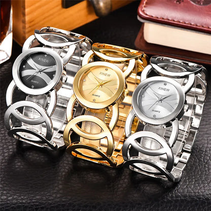 Une très belle montre luxueuse de steel magic 2024 pour femme de couleur gold et argent